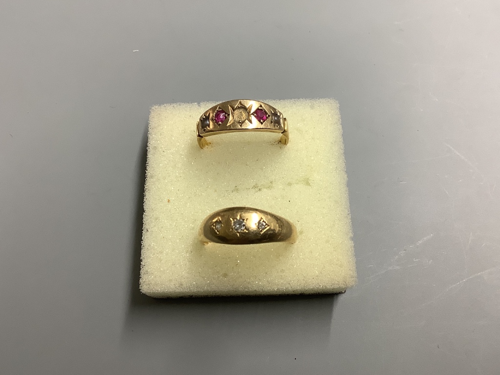 Three assorted 18ct and diamond set dress rings, gross 7.2 grams